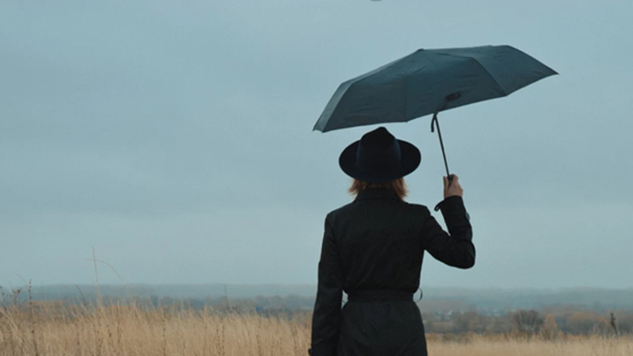image brain fog woman with umbrella