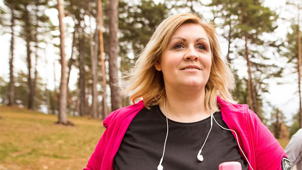 menopausal patients at metabolic risk image of woman walking with weights