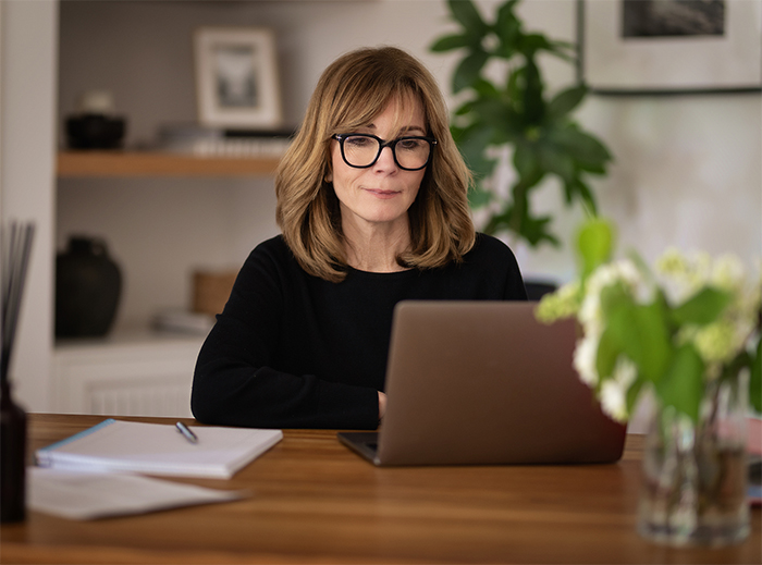 Woman working on a laptop