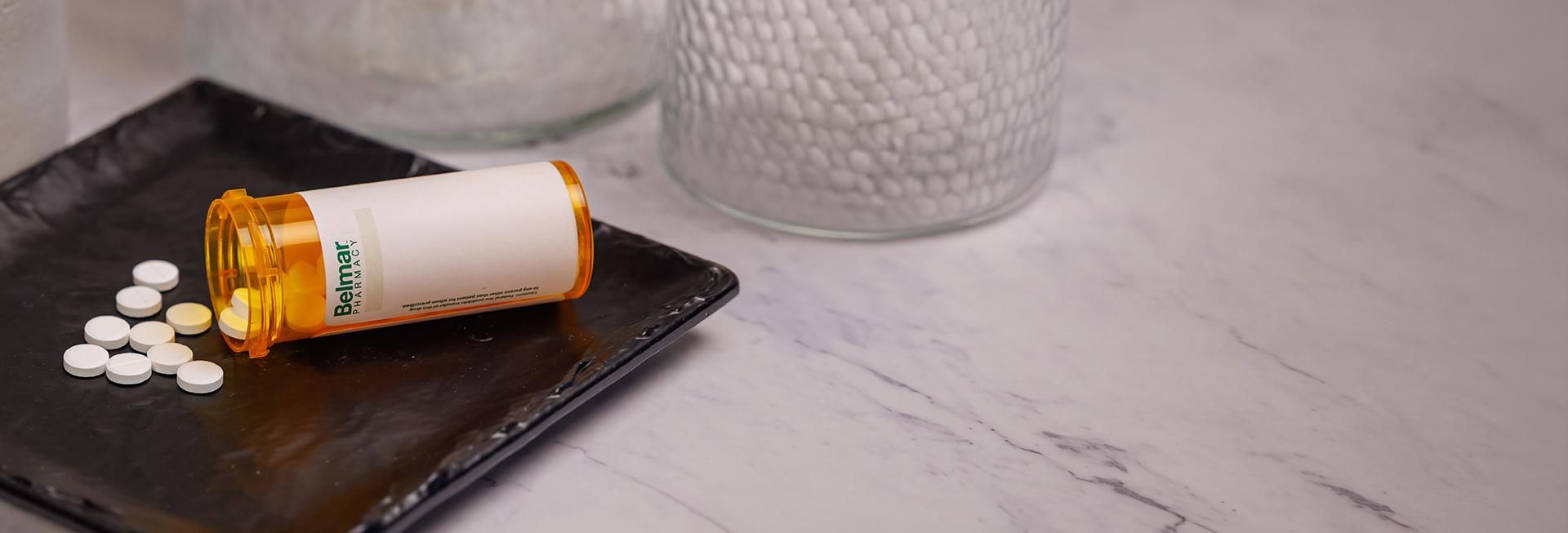 Belmar Pharma Solutions Testimonials Banner with Pill Bottle