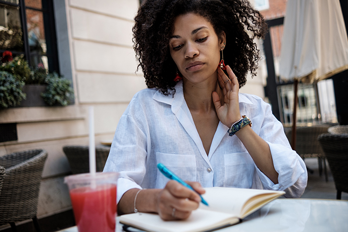 desiccated thyroid compound medication image of woman writing in a notebook