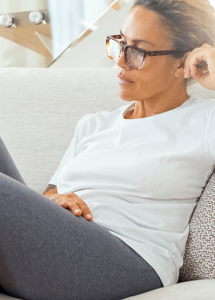dsypareunia symptoms woman on couch