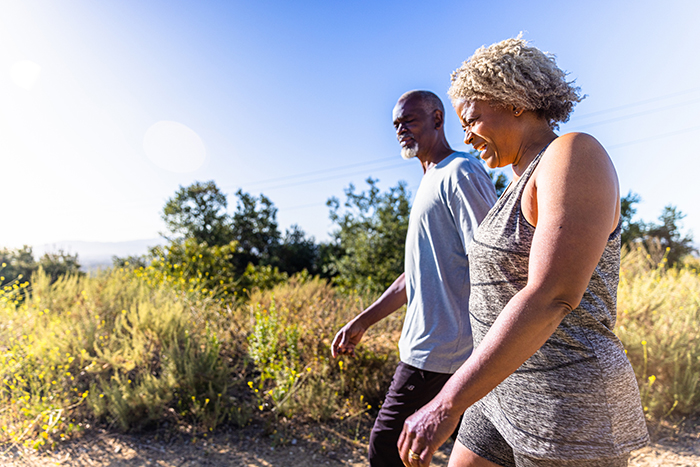 couple walking outside. Gonadorelin acetate is available from Belmar Pharmacy