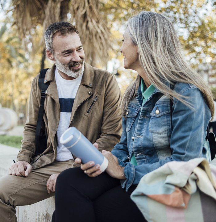 hormone pellets for women image with smiling man and woman