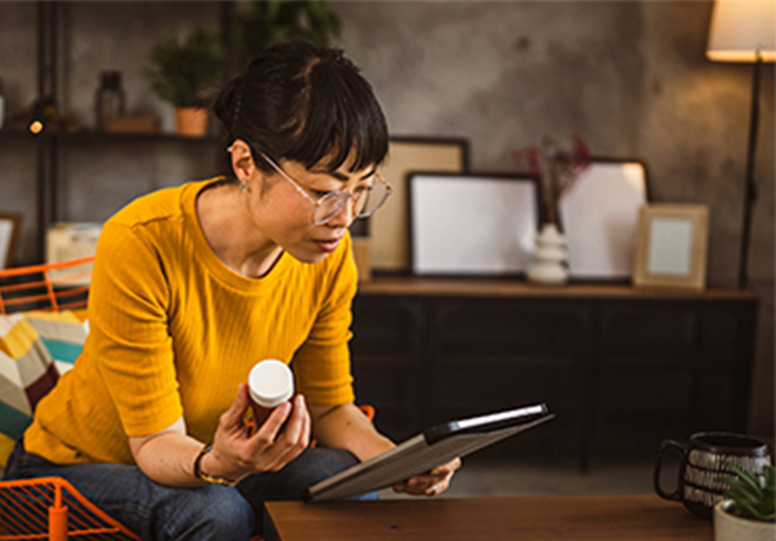 information on demand image of a woman looking up medication information