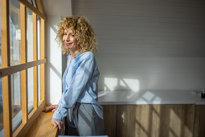 liothyronine sodium medication image of a woman looking out the window