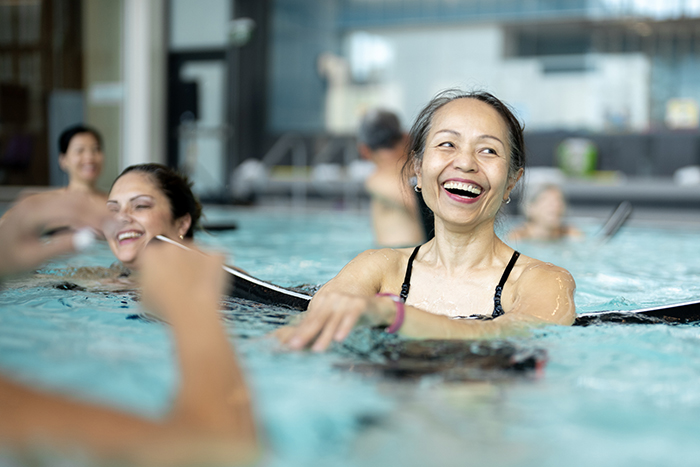 nicotinamide adenine dinucleotide nad medication image image of a woman laughing in a pool