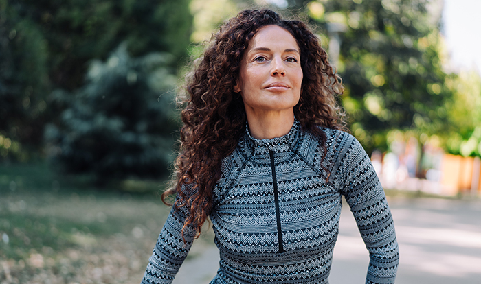 sermorelin acetate injection medication image of a woman on a trail