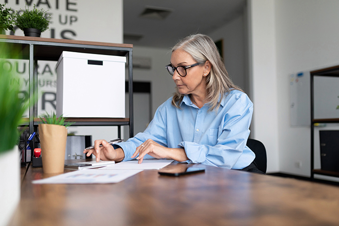 ultra low dose naltrexone medication image of a woman writing
