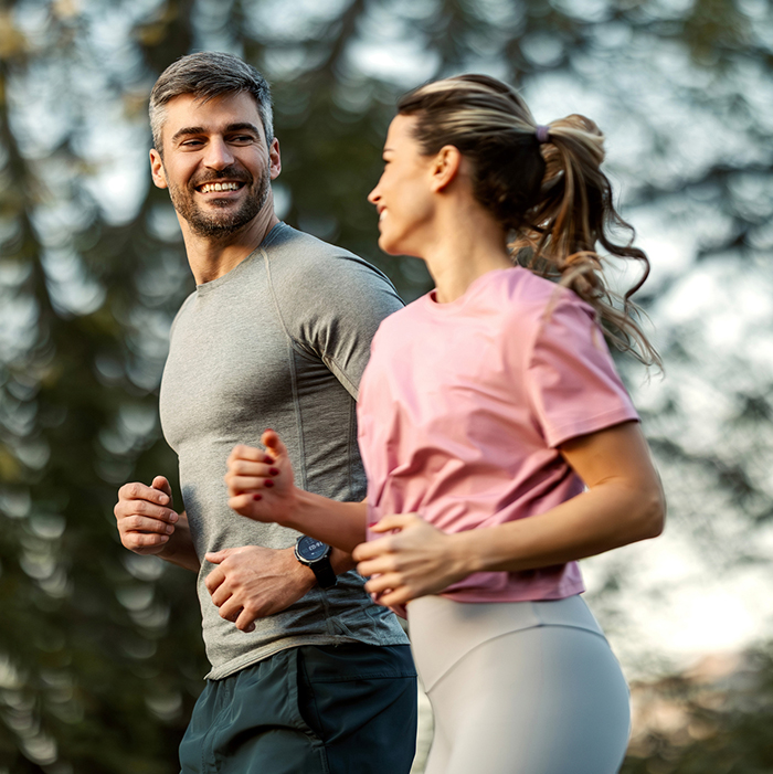 wellness medications image of man and woman running