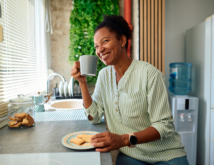 wellness products image of woman smiling while eating
