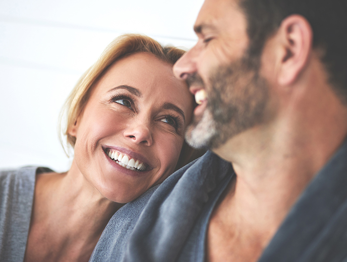 women's sexual health couple smiling at each other